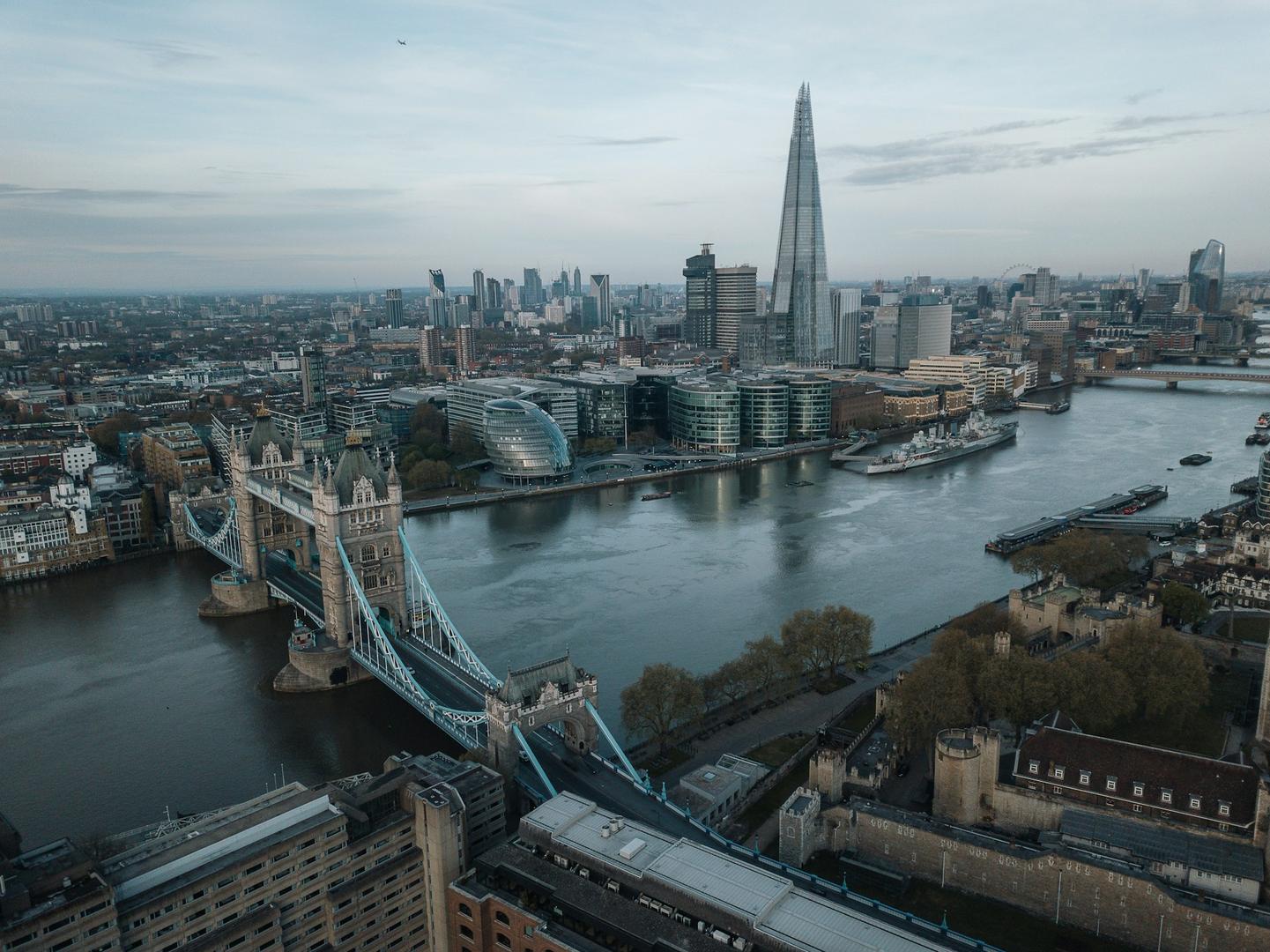 UK flag blended with digital blockchain network illustration