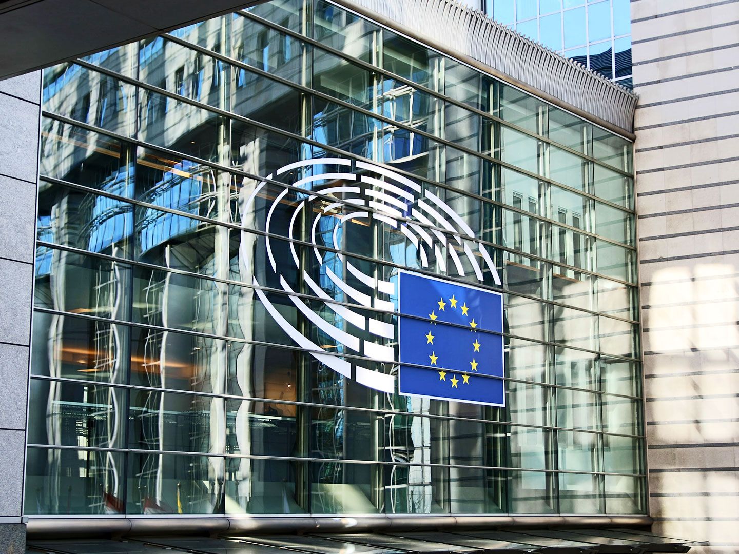 Illustration of European flag blending into digital prediction chart with abstract investor figures